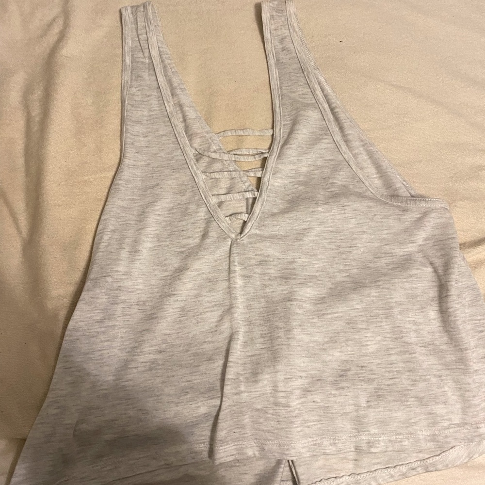 Light grey tank top. Size: Medium